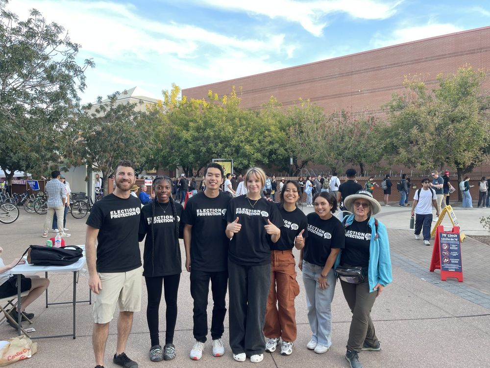 Election protection volunteers gathered outdoors